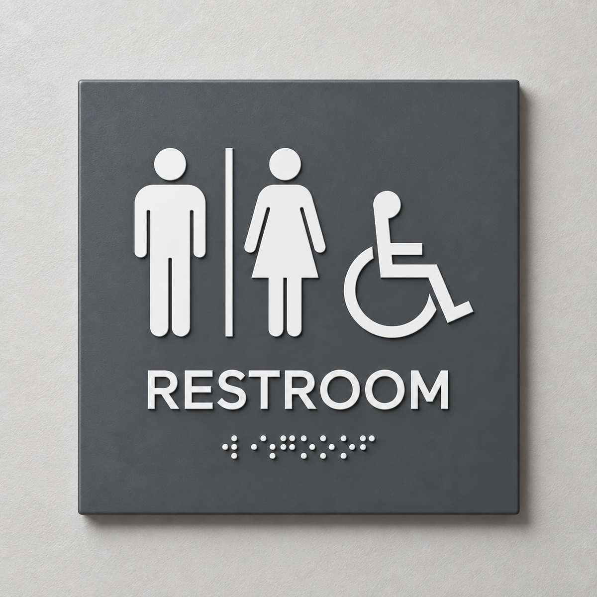 Charcoal Grey ADA restroom sign with White raised male, female and accessibility symbols, tactile RESTROOM text and Braille.